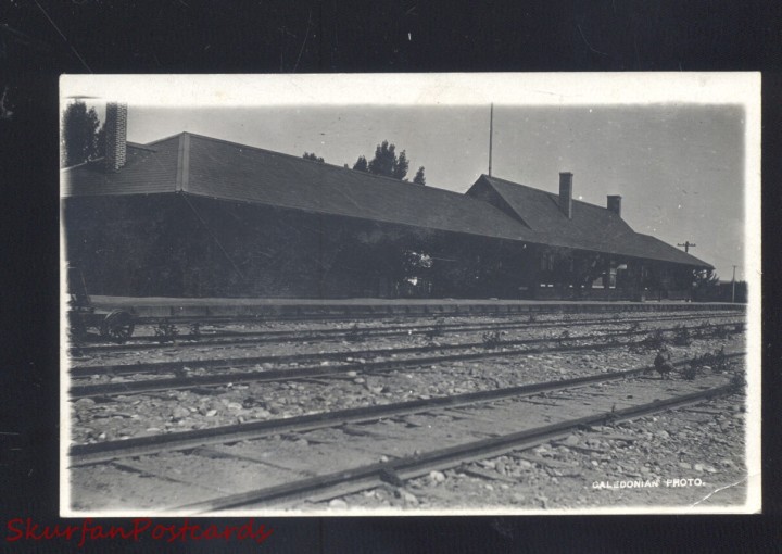 Black and white image of a railroad station